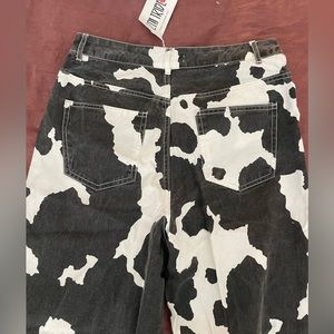 12th tribe NWT sz medium cow print jeans